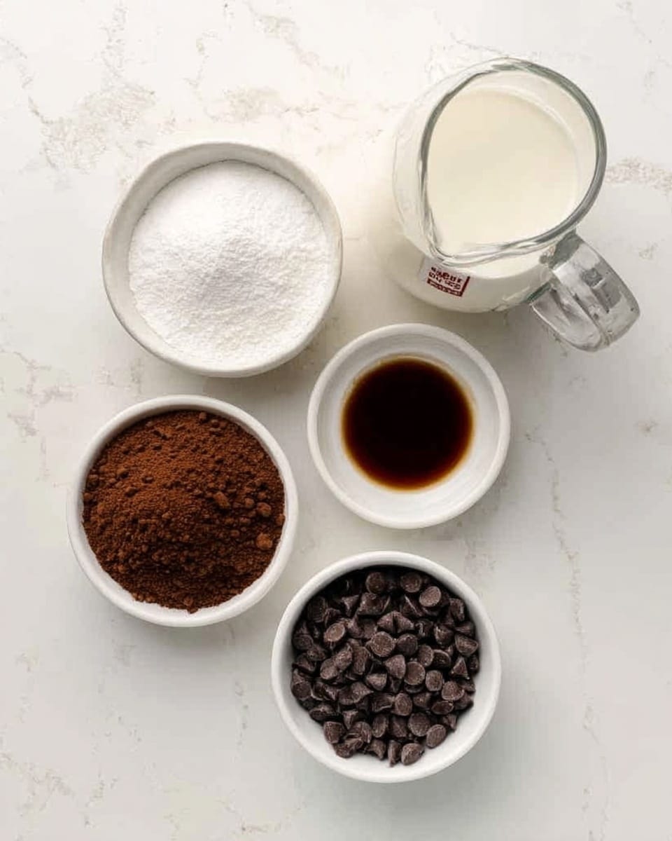 A top view of five white bowls and a small clear jug arranged on a white marbled surface. The top right jug holds white milk with a small metal label on the rim. Next to it is a white bowl filled with white sugar. Below the jug is a small white bowl with dark brown vanilla extract. On the left side, there is a white bowl filled with dark brown cocoa powder above another white bowl full of shiny dark chocolate chips. The colors are mainly white and dark brown, showing clear textures of powder, chips, and liquid. photo taken with an iphone --ar 4:5 --v 7