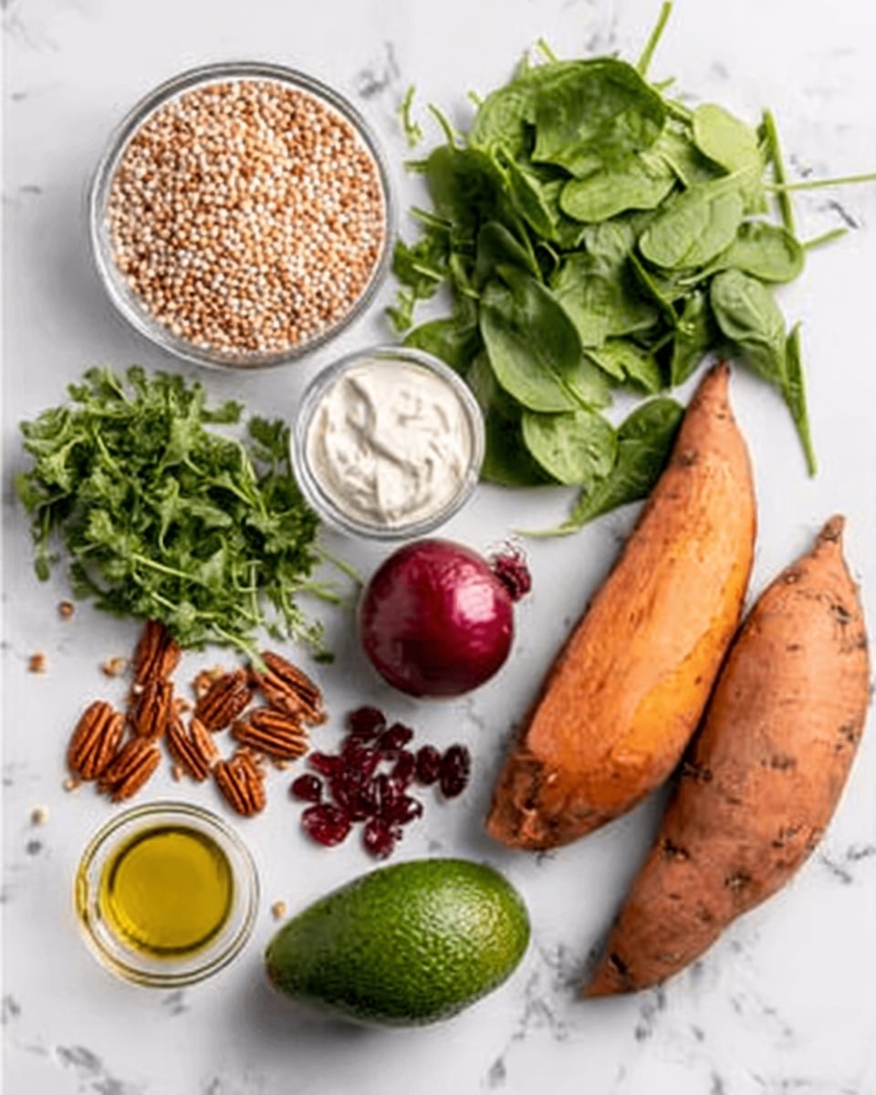 The image shows a clean white marbled surface with various ingredients neatly arranged. There are two large orange sweet potatoes placed diagonally on the right. Near the top center is a small white bowl filled with creamy white sauce. To the left of that is a clear bowl filled with round, light beige grains. Below these, several fresh green leaves and herbs are spread out, including parsley, arugula, and spinach. A small red onion and a whole avocado sit near the group of greens. On the bottom left are toasted pecans and bright red dried cranberries placed close together. A clear glass container with golden olive oil is positioned above the greens. The whole arrangement is colorful and balanced, with natural textures and colors contrasting on the white marbled surface. photo taken with an iphone --ar 4:5 --v 7