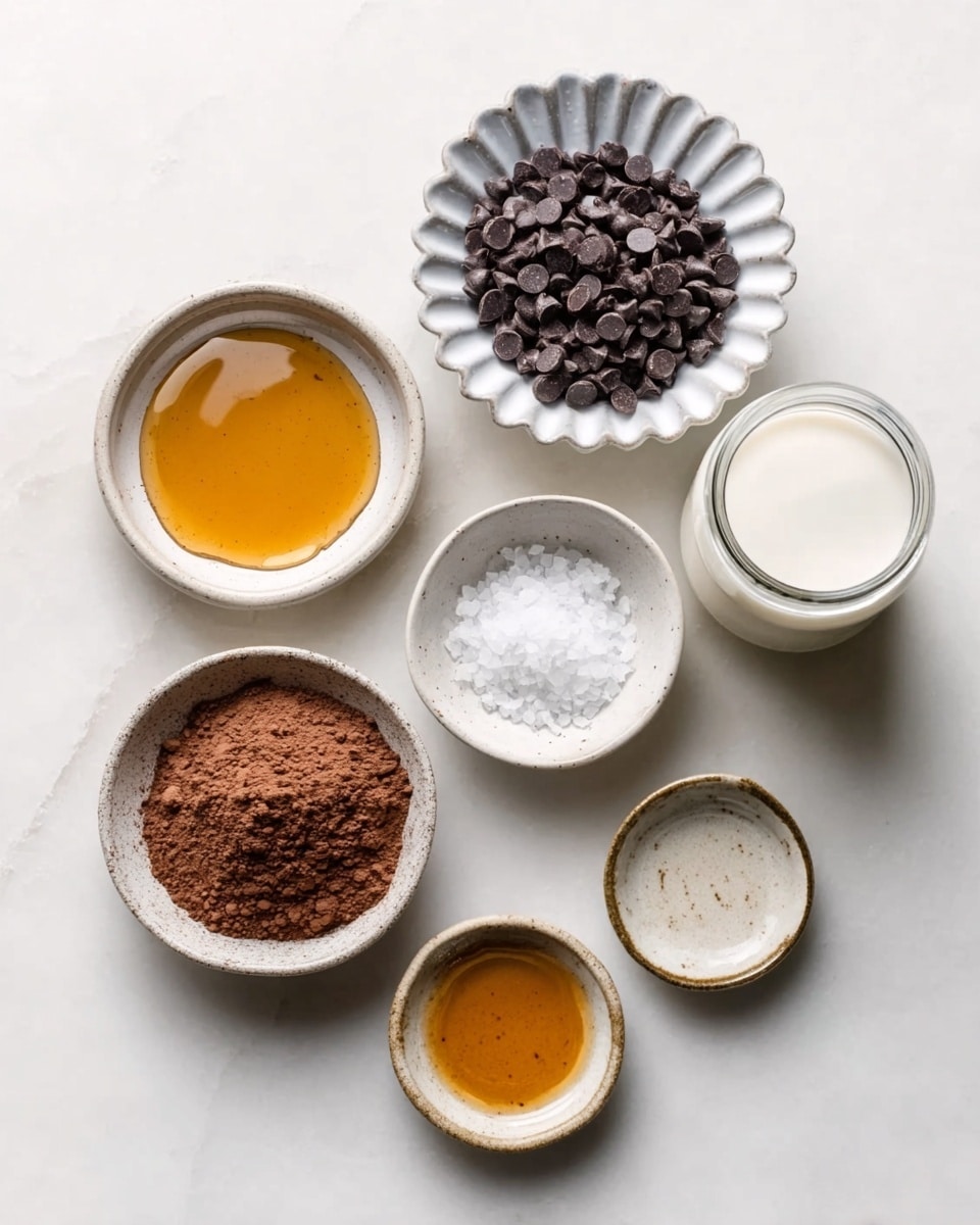 The image shows six small white bowls placed on a white marbled surface. At the top, a white scalloped bowl is filled with dark chocolate chips, showing a shiny and smooth texture. Below it on the left, a white bowl contains a golden brown liquid, likely honey or syrup, with a glossy surface. Next to it, a small white bowl holds coarse white salt crystals that look rough and uneven. To the right, a tall glass jar is filled with a white, smooth milk-like liquid. On the bottom left, a deeper white bowl contains fine cocoa powder, dark brown and matte, with some texture on the surface. Adjacent to it, a small white bowl has a clear amber-colored liquid, smooth and reflective. The bowls are neatly arranged in a loose circle on the clean white marbled background, with soft lighting highlighting their colors and textures. photo taken with an iphone --ar 4:5 --v 7