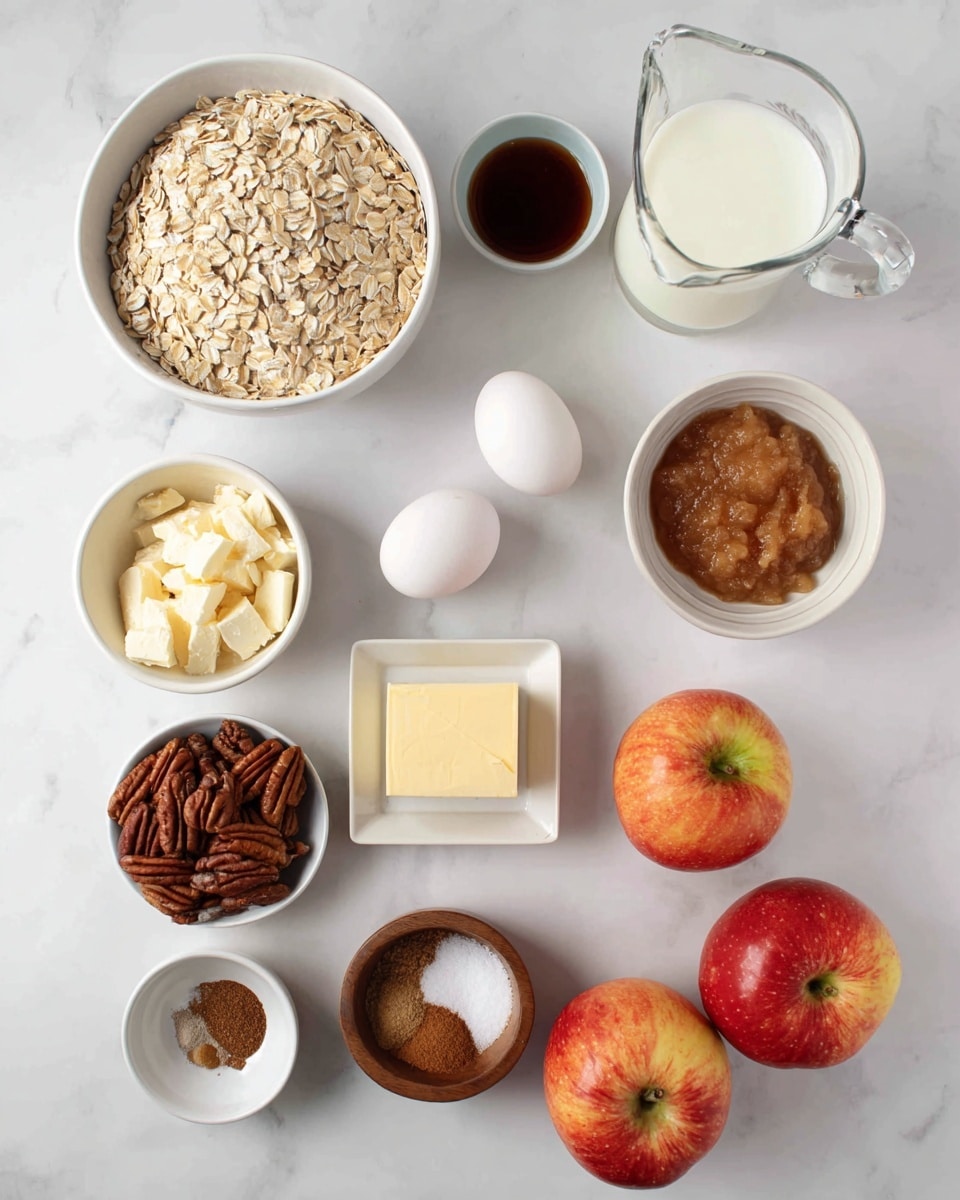The image shows several ingredients placed neatly on a white marbled surface. At the top left, there is a white bowl filled with pale beige rolled oats. To the right, a glass pitcher contains fresh white milk. Below the oats, a small white bowl holds dark amber syrup, while to the right there is a small bottle of dark vanilla extract. Next to the vanilla, a white bowl is filled with light tan applesauce. Near the center are two white eggs placed side by side. A small square white dish near the eggs has an assortment of spices in brown and white colors. Below them, a wooden bowl holds a light yellow square of butter. To the left, there is a white bowl filled with light brown sugar and another white bowl with dark brown pecan halves. Finally, three apples with red and yellow skin are scattered at the bottom right of the image. Photo taken with an iphone --ar 4:5 --v 7