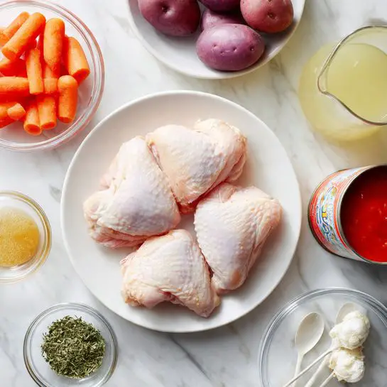 The image shows three raw chicken pieces placed in the center of a white plate against a white marbled surface. Surrounding the plate are small clear bowls and containers holding different ingredients: sliced bright orange carrots in the top left, whole purple-red potatoes in the top center, a can of tomato sauce on the top right, a pitcher of light yellow liquid with two white spoons inside on the far right, and smaller clear bowls below filled with white creamy substance, a golden-brown liquid, minced garlic, and various green dried herbs. The setup is clean and organized, presenting a clear view of each ingredient. Photo taken with an iphone --ar 4:5 --v 7