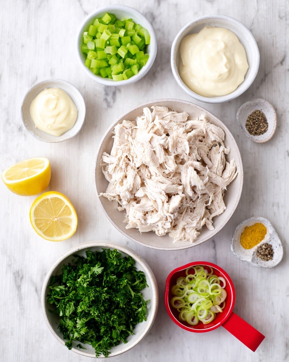 The image shows several small white bowls with different ingredients arranged on a white marbled surface. In the center, a large white bowl is filled with shredded white cooked chicken, its texture soft and flaky. Above the chicken bowl, to the left, there is a small white bowl with bright green chopped celery pieces, while to the right, another white bowl holds smooth, creamy white mayonnaise. Below the mayo, a white bowl contains fresh green parsley leaves with a curly texture. Next to it on the right, a red measuring cup is filled with sliced green onions, their rings clearly visible. Below the chicken bowl, on the left side, a lemon half shows its bright yellow flesh and seeds. To the right of the lemon, a small white dish holds a small pile of yellow mustard, smooth and thick. Lastly, another small white dish contains a mix of white, black, and yellow spices. Photo taken with an iphone --ar 4:5 --v 7