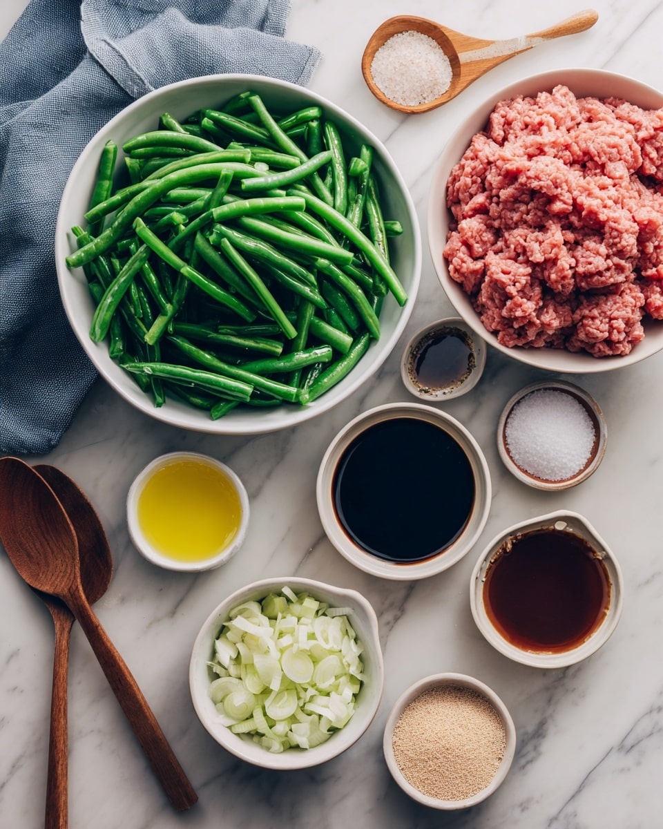 The image shows a white bowl filled with green frozen cut green beans on the left side, next to a white bowl on the right filled with fresh pink ground meat. Around these two main bowls are smaller white bowls containing chopped white onions, minced light yellow garlic, and a dark reddish-brown sauce. There are also small dishes holding a bright yellow liquid, a dark soy-like liquid, white granulated salt, coarse white salt, light brown powder, and beige granules. All bowls and dishes are placed on a white marbled surface with a folded blue-gray cloth and a wooden spoon in the top left corner. photo taken with an iphone --ar 4:5 --v 7