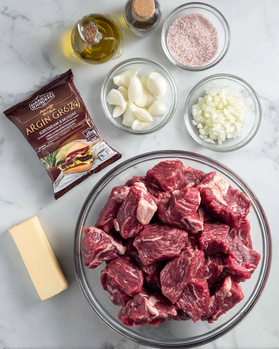 The image shows a clear glass bowl filled with many large chunks of marbled raw beef, red and white mixed in color, placed on a white marbled surface. Above it, there is a brown packet of McCormick Au Jus Gravy mix with a picture of a sandwich on it. To the right, two small glass bowls contain chopped white onions and minced garlic. At the top, two tall rectangular containers hold pink Himalayan salt and black pepper. On the top left side, a clear glass bottle filled with olive oil is visible. At the bottom left, a stick of butter is partially unwrapped. All items are arranged neatly on the white marbled surface. photo taken with an iphone --ar 4:5 --v 7