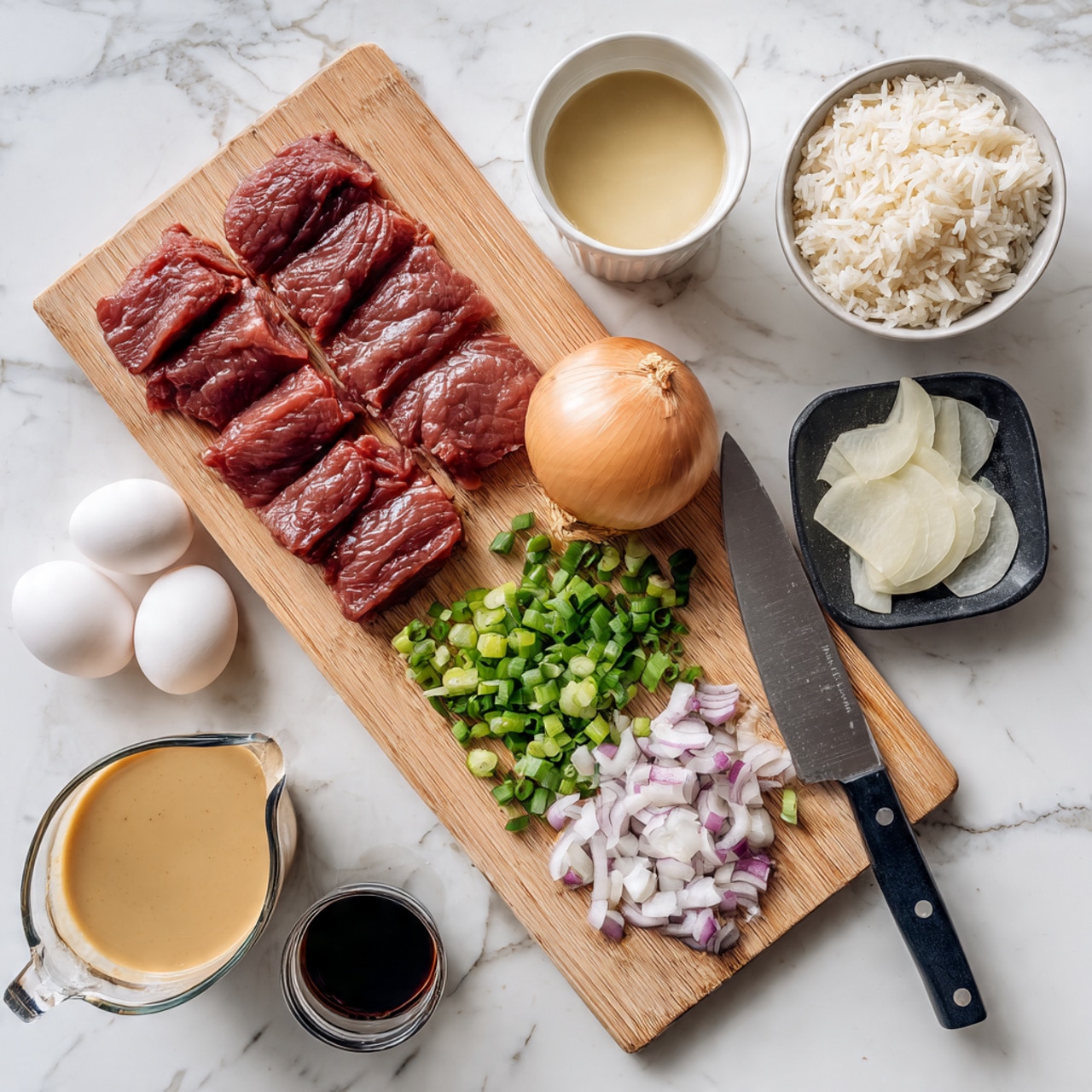 The image shows a wooden cutting board with six strips of raw red meat neatly arranged in a row on the left side. On the right side, there is a small pile of sliced green onions and shallots in light purple and white colors, next to a large silver knife with a dark handle resting on the cutting board. Around the board, there are various ingredients including a clear glass bowl with dark soy sauce downtown, an orange onion on the top right corner, a white bowl with clear liquid near the onion, two white eggs on the bottom left, and a small black dish with pale orange ginger slices. The whole scene is set on a white marbled surface. Photo taken with an iphone --ar 4:5 --v 7