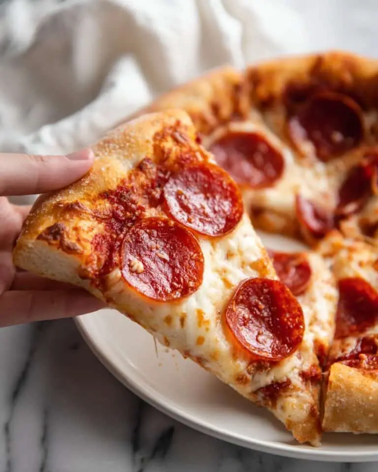 Homemade Classic Pizza with Tomato Sauce and Melty Cheese Recipe