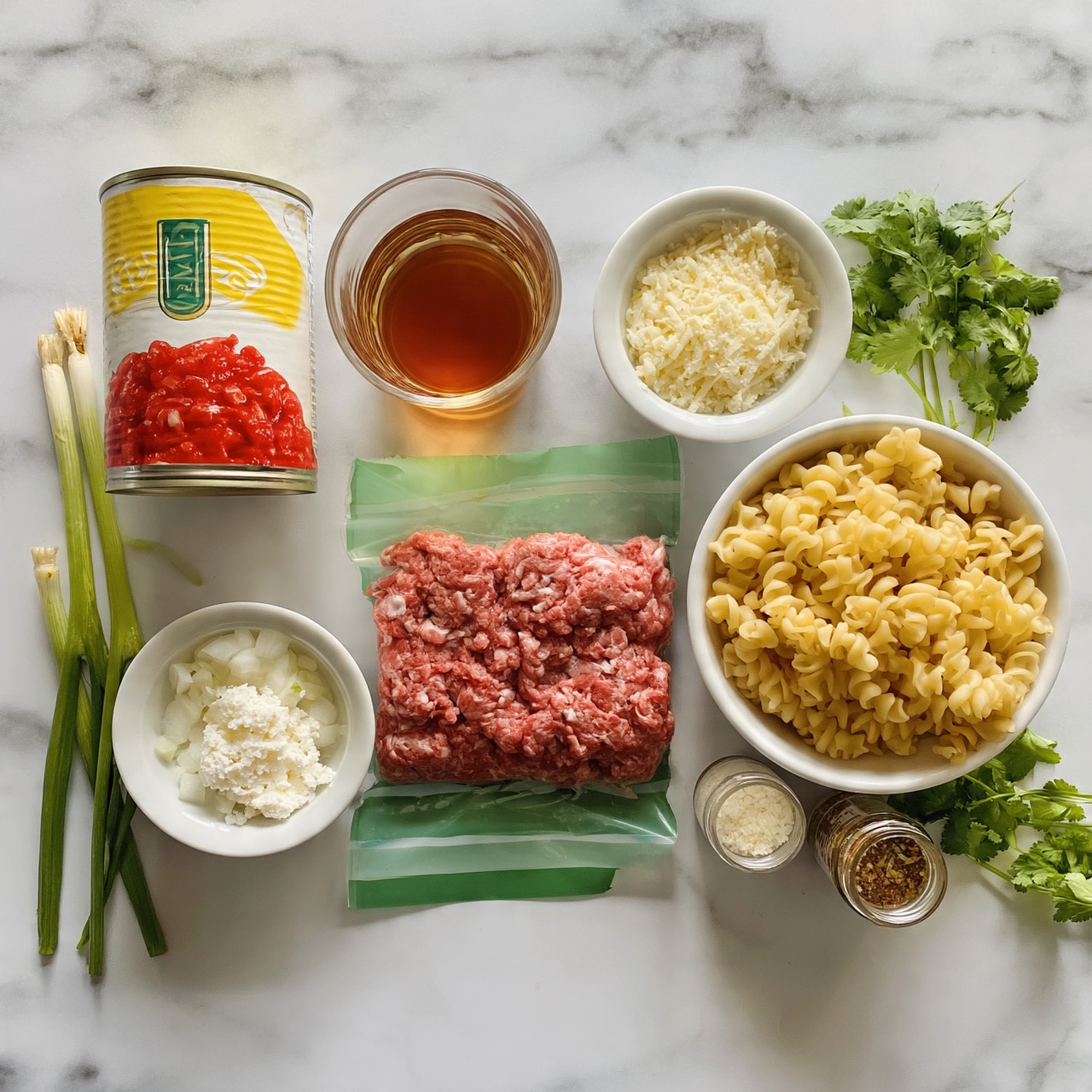 square image The image shows an overhead view of cooking ingredients arranged neatly on a white marbled surface. There is a can of crushed tomatoes in yellow and red colors, a clear glass filled with amber liquid, a package of raw ground meat in green packaging, and a white bowl filled with spiral pasta. Around these main items are smaller white bowls containing grated cheese, chopped onions, and a white crumbly ingredient. Additionally, there are two small jars with seasoning and a few sprigs of fresh herbs including green onion stalks and cilantro. The colors range from bright reds and greens to creamy whites and pale yellows, all set against the smooth, white marbled background. photo taken with an iphone --ar 4:5 --v 7