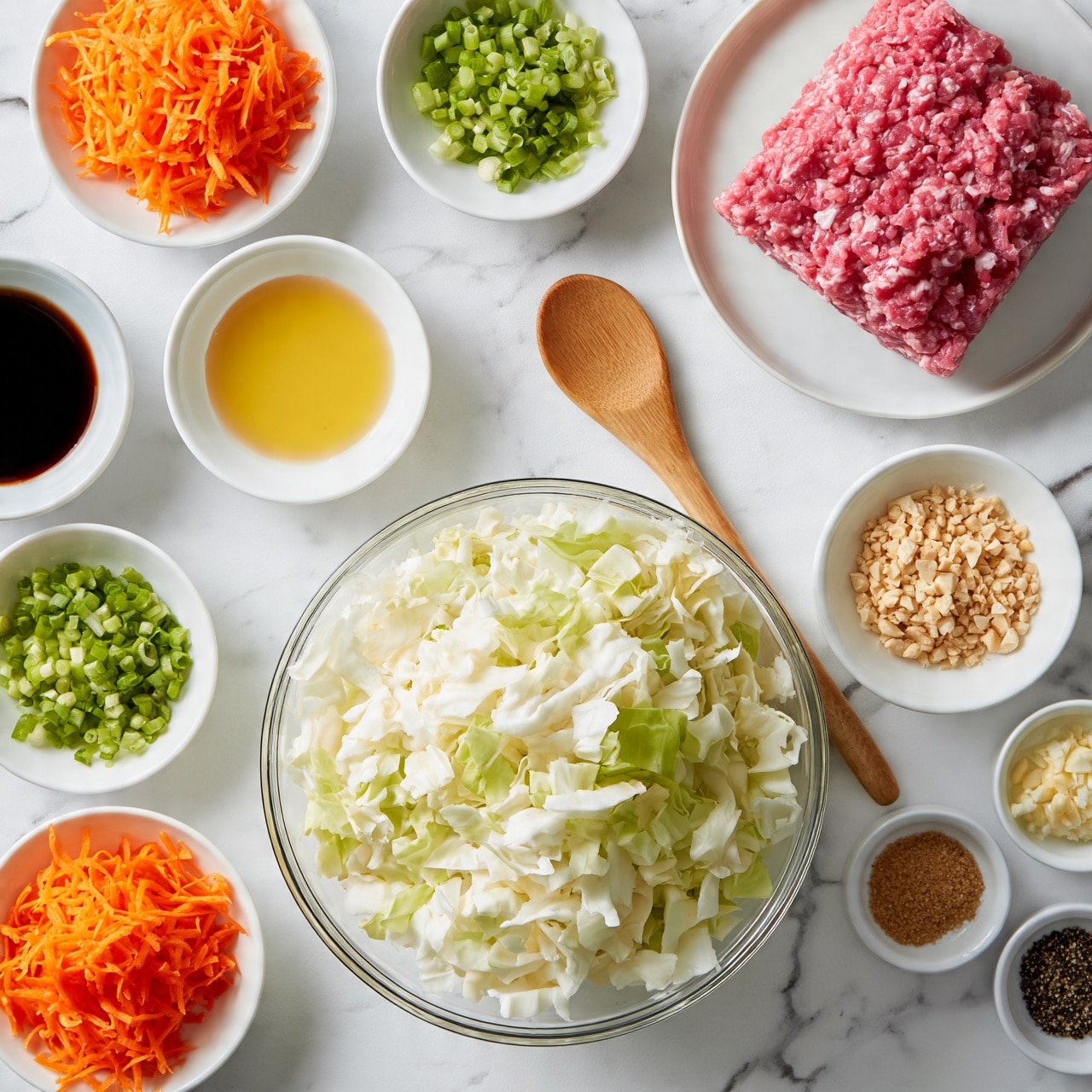 square image The image shows many small bowls and plates arranged neatly on a white marbled surface. In the center is a medium glass bowl filled with white and light green chopped cabbage. To the top right of the bowl is a white plate with a block of raw ground meat, bright pink and textured. Around these, smaller white bowls hold bright orange shredded carrots, green chopped green onions, yellow soy sauce, and beige crushed nuts. Additional small containers hold dark soy sauce, light oil, minced garlic, brown sugar, and black pepper. A wooden spoon is placed near the center, adding a natural touch. The colors are fresh and clean, with the white dishes making the food colors stand out. photo taken with an iphone --ar 4:5 --v 7