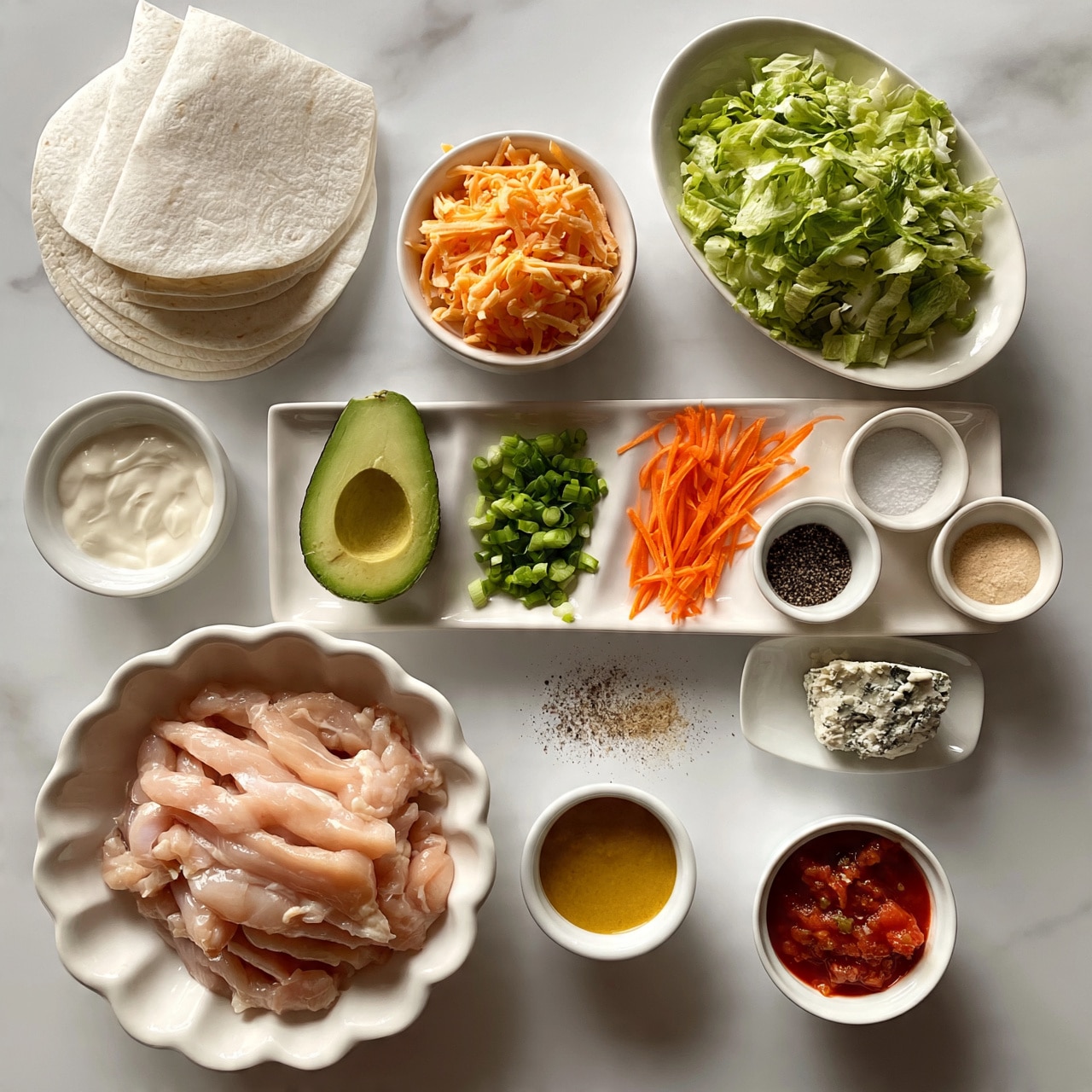 square image The image shows ingredients for making wraps, laid out on a white marbled surface. At the top left, there are two white tortillas stacked together. Below them, a small white bowl holds shredded orange cheese. To the right of the cheese, a white oval bowl is filled with chopped green lettuce. Below the tortillas and cheese, a long white plate holds three sections: thin orange carrot strips on the top right, chopped green onions in the middle, and half of a green avocado with the seed on the bottom left. To the left of this plate is a small white bowl with a creamy white sauce. To the right of the avocado plate, there are three small white bowls, holding black pepper, white salt, and a light beige powder. Below these, a small white plate has a piece of blue cheese. To the bottom left, a large white scalloped bowl contains raw pink chicken strips. Below the spices, a small white round bowl contains a mustard yellow sauce, and to its right, a white bowl holds red salsa. All items are arranged neatly with clear space between them. photo taken with an iphone --ar 4:5 --v 7