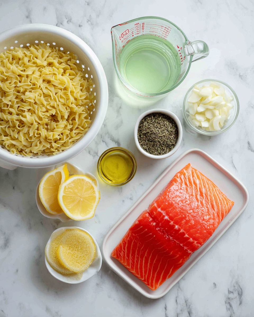 The image shows ingredients for a meal arranged on a white marbled surface. There is a white colander filled with cooked yellowish noodles at the bottom left, next to a glass measuring cup with a light green liquid. Above that cup is a small white bowl with dried herbs that are brown and green. To the right is another small white bowl with thin white garlic slices. Above it is a glass bowl with clear yellow oil, and below that is a smaller glass bowl with a yellow paste-like mix. Next to these bowls, on the right side is a white plate with thin yellow lemon slices. At the bottom right is a white rectangular dish holding a large piece of bright red salmon fillet with shiny texture. The arrangement is clean and simple, with good lighting. Photo taken with an iphone --ar 4:5 --v 7
