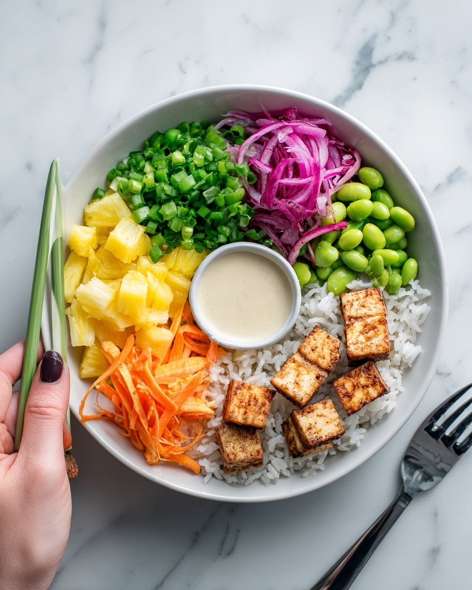 A white bowl on a white marbled surface filled with a colorful layered poke bowl. At the bottom, there is a layer of white rice. On top of the rice, there are five sections: bright green chopped scallions, light yellow chopped pineapple, thin orange carrot strips, light pink pickled onion, and green edamame beans. In the center, there is a small white bowl of creamy sauce, and around it are several golden-brown grilled tofu pieces arranged in a fan shape. A white fork rests to the right of the bowl, and a woman's hand is holding a green chopstick above the bowl. photo taken with an iphone --ar 4:5 --v 7