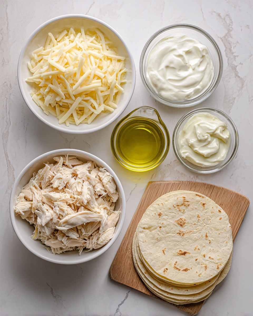 The image shows an overhead view of five ingredients laid out on a white marbled surface. In the center, there is a white bowl filled with shredded light beige chicken pieces. To the left of the chicken, a white bowl contains shredded pale yellow cheese. Below the cheese, a clear glass measuring cup holds a yellow-green sauce. Above the chicken, a small clear bowl is filled with white sour cream showing a smooth, creamy texture. To the right, a stack of white corn tortillas rests on a wooden cutting board, neatly arranged with visible soft texture and round edges. Photo taken with an iphone --ar 4:5 --v 7