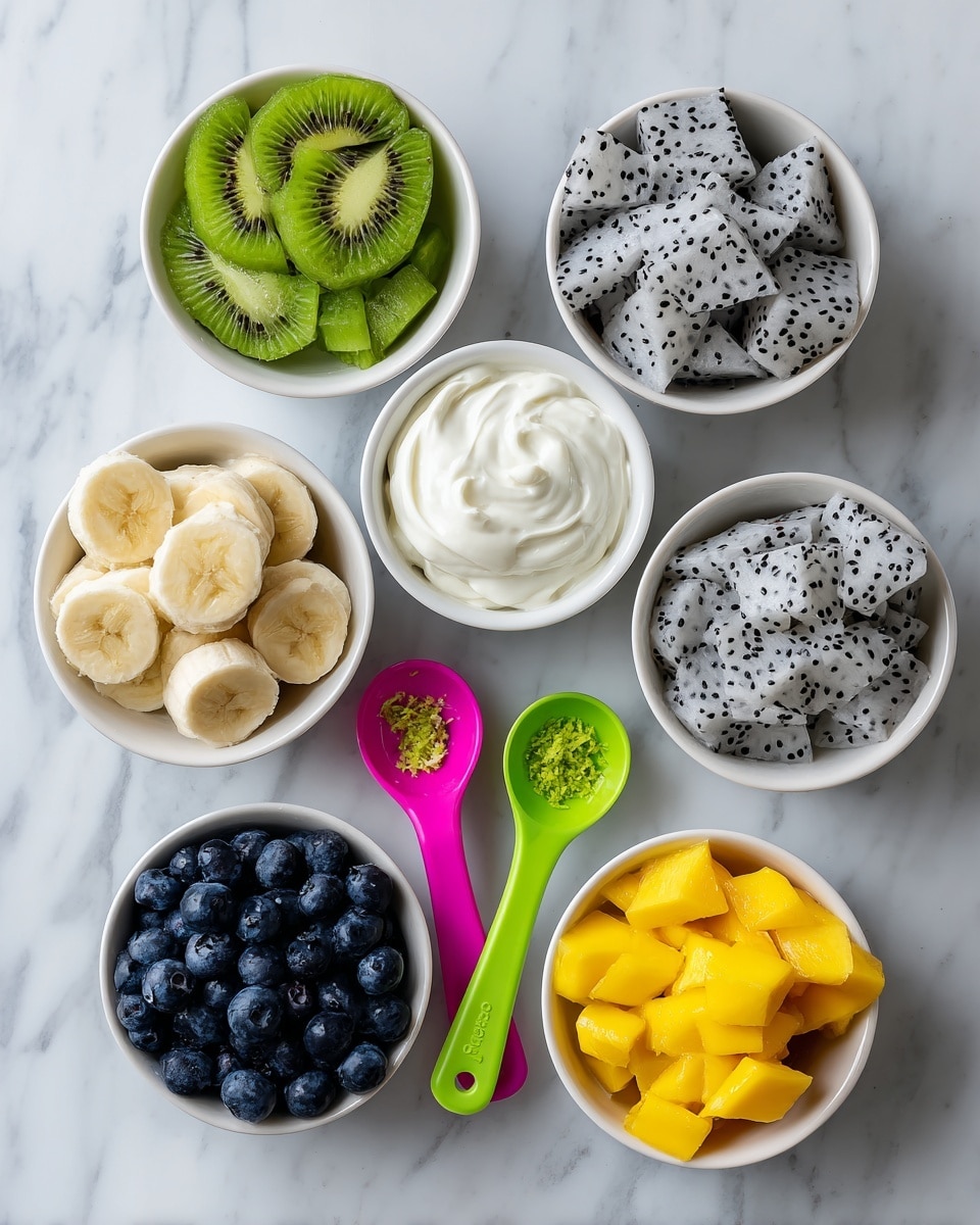 The image shows six white bowls arranged on a white marbled surface, each containing different fresh ingredients. Starting from the top left, there is a bowl filled with bright green sliced kiwi fruit, followed by a bowl of thick white creamy yogurt in the center. To the right is a bowl with white and black speckled dragon fruit pieces. On the bottom left is a bowl of dark blue blueberries, next to it a bowl with evenly sliced banana pieces. Finally, on the bottom right there is a bowl of bright yellow mango chunks. Two colorful measuring spoons, pink and green, are placed in the middle with some lime zest on the green spoon. The arrangement is neat and the colors contrast well against the clean white marbled background. Photo taken with an iphone --ar 4:5 --v 7