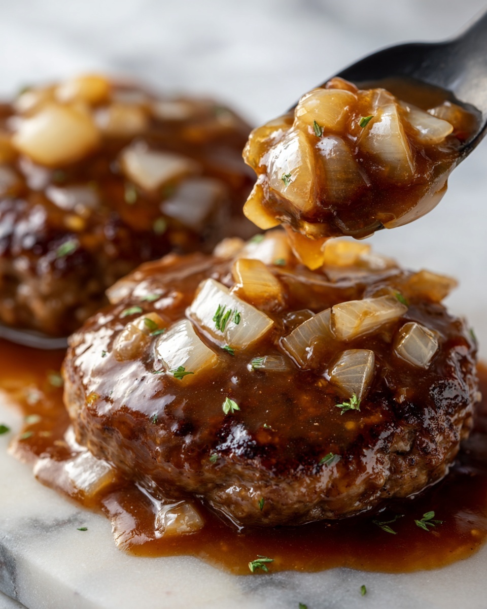The image shows two large, browned patties covered by a thick, shiny brown sauce with chunks of soft cooked onions on top and around them. The sauce has a rich, smooth texture with glossy highlights, and the patties have a slightly rough surface with hints of herbs. A black spoon is lifting one patty, showing more sauce and onions clinging to its sides. The scene has a close-up, tight frame with a soft focus on the sauce’s shiny texture. The background surface is a white marbled texture. photo taken with an iphone --ar 4:5 --v 7