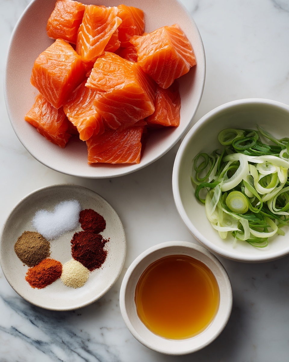 The image shows four white bowls arranged on a white marbled surface. The largest bowl is filled with bright orange cubed salmon pieces, showing the fish’s texture and fat lines. To the right, a smaller white bowl holds thinly sliced green onions, varying shades of light and dark green. Below, another white bowl contains a warm amber liquid, likely honey or a similar syrup, with a smooth, glossy texture. To the left, the smallest bowl displays four piles of spices in brown, red, and beige colors, arranged in pairs across from each other with a bit of white salt in the center. photo taken with an iphone --ar 4:5 --v 7