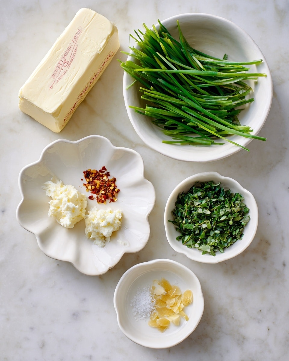 The image shows a white marbled surface with four white dishes and a stick of butter arranged neatly. At the top left, there is an unopened stick of butter with red text on the wrapper. To the right, a white bowl holds chopped green herbs that look like green onions. Below that, a smaller white bowl contains finely chopped green leafy herbs. At the bottom left, a white dish with scalloped edges holds four small piles: creamy white minced garlic on the left, reddish-brown crushed chili flakes at the top, bright yellow ginger pieces at the bottom, and a small spot of salt spread around the dish. photo taken with an iphone --ar 4:5 --v 7
