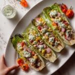 Grilled Romaine Salad with Cherry Tomatoes, Avocado, and Lemon-Dijon Dressing Recipe