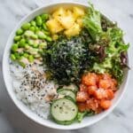 Homemade Ahi Tuna Poke Bowl with Fresh Vegetables and Spicy Sauce Recipe