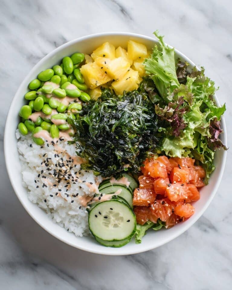 Homemade Ahi Tuna Poke Bowl with Fresh Vegetables and Spicy Sauce Recipe