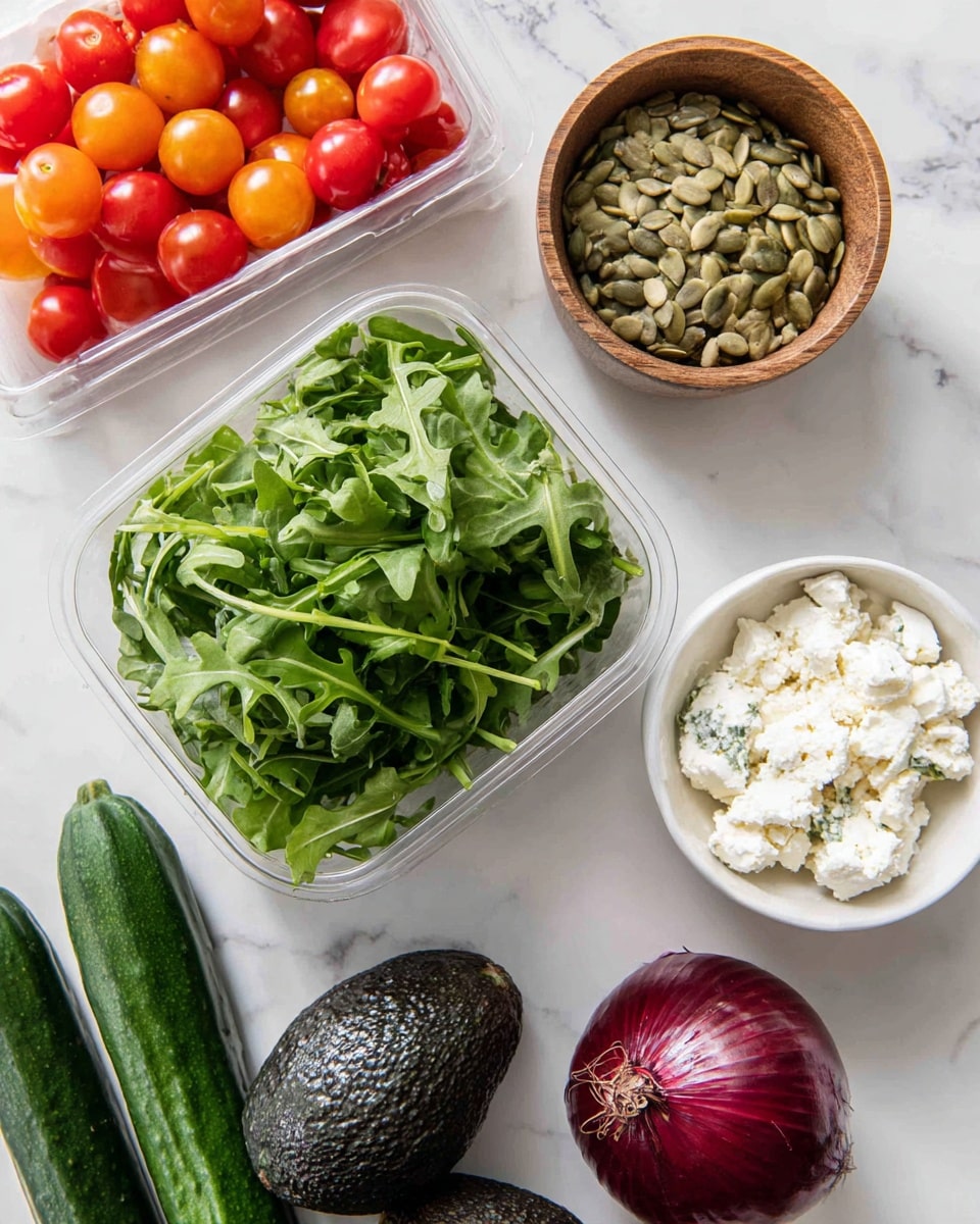 The image shows ingredients for a fresh salad arranged on a white marbled surface. In the center, there is a clear plastic container filled with dark green baby arugula leaves. Above it, there is a small round wooden bowl filled with light brown pumpkin seeds. To the right of the arugula, a small white ceramic bowl holds crumbly white cheese. Next to the bowl, on the far right, there is a whole, shiny deep red onion. On the bottom left side, two dark green avocados rest close together, and just below the arugula container, two long dark green cucumbers are placed side by side. In the top left corner, there is a clear plastic box holding a mix of red and orange cherry tomatoes. The arrangement highlights the fresh, natural colors and textures of the ingredients, all set against a clean white marbled background. photo taken with an iphone --ar 4:5 --v 7