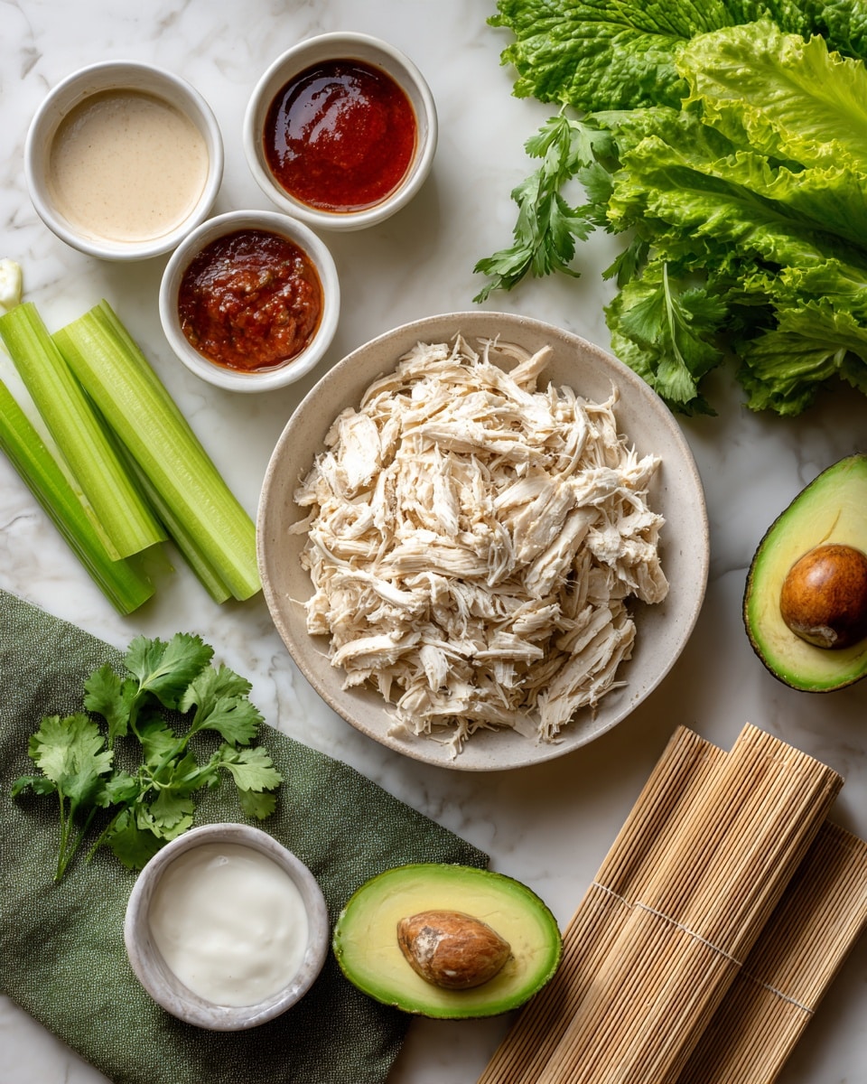 The image shows a white marbled surface with several items arranged neatly. In the center, there is a white bowl filled with shredded light brown chicken. To the upper left of the bowl, there are two small white bowls, one with light beige sauce and the other with red sauce. Below them, a green cloth napkin is placed with a few sprigs of cilantro on and around it. At the bottom left, there is a small white bowl containing white creamy sauce. On the right side of the bowl, two stalks of green celery lay diagonally. Next to celery, there is a cut dark green avocado with its pit visible and a whole avocado beside it. On the far right, a bunch of fresh green romaine lettuce stands upright. A bamboo sushi rolling mat is placed horizontally near the bottom right. Photo taken with an iphone --ar 4:5 --v 7